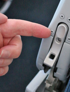 secret armrest button aisle