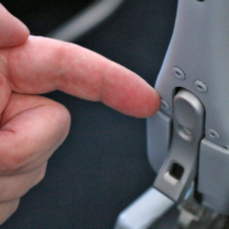 secret armrest button aisle