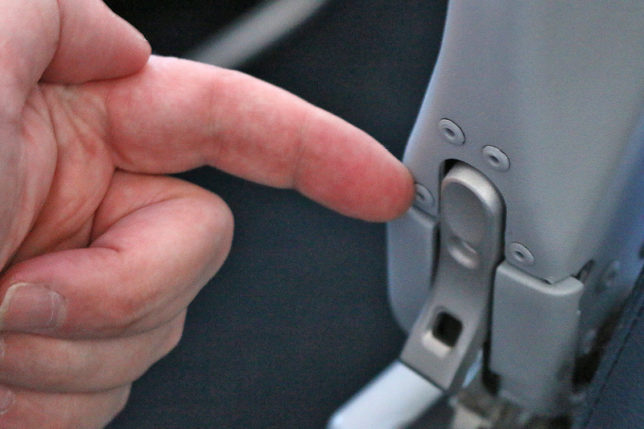 secret armrest button aisle