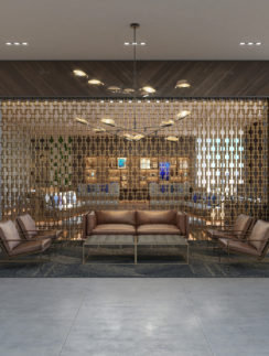 a room with a couch and chairs