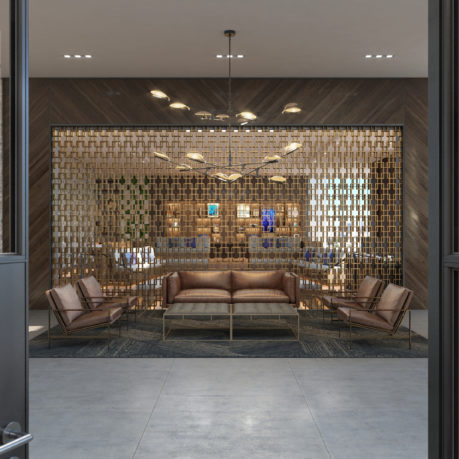 a room with a couch and chairs