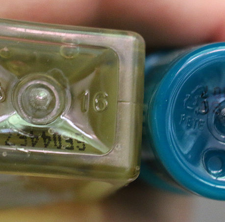 Miniature plastic toiletry bottle