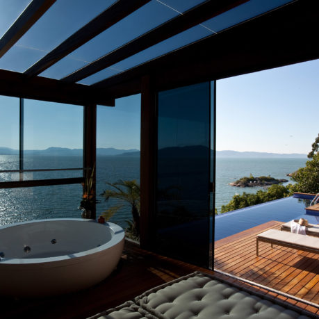 a large tub overlooking a body of water