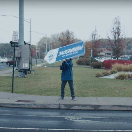 a person holding a sign