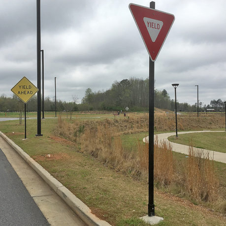 a yield sign on a pole