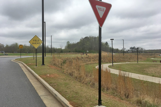 a yield sign on a pole