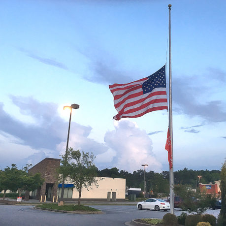 American flag half staff