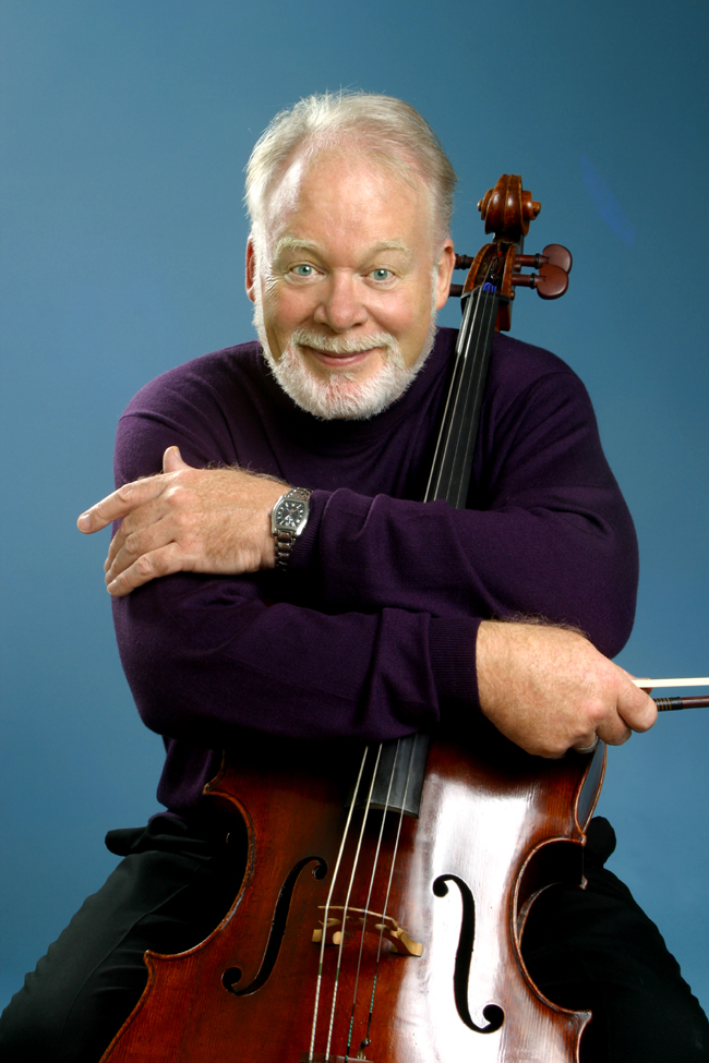 a man with a beard and a cello