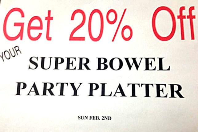 a sign with red text