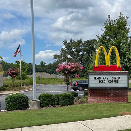 a sign on a brick building