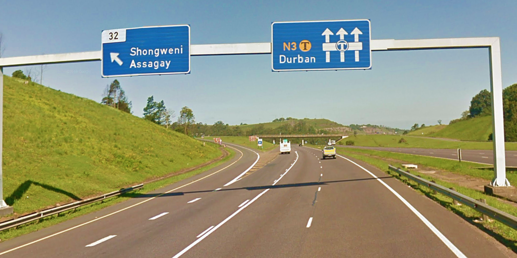 a road with signs on it