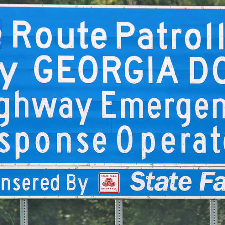 a blue sign with white text