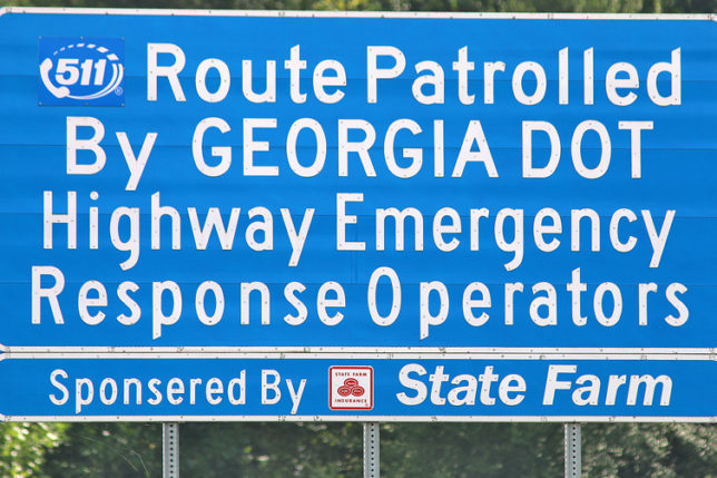 a blue sign with white text