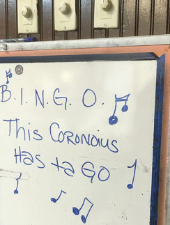 a white board with blue writing on it