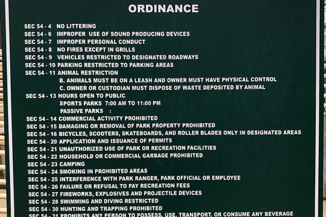 a sign with white text on it