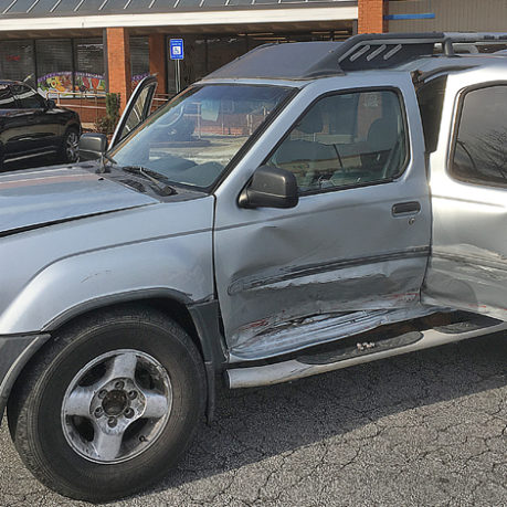 a car with a dented door