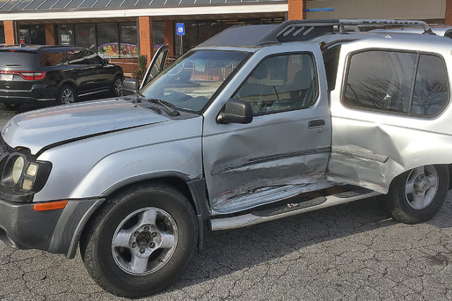a car with a dented door