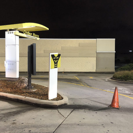 a sign in a parking lot