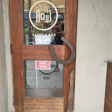 a door with a horseshoe on it