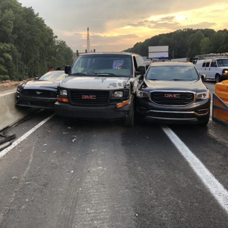 a group of cars on a road