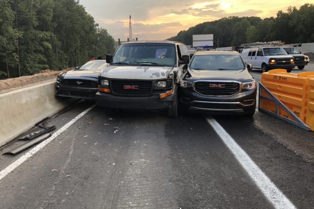 a group of cars on a road