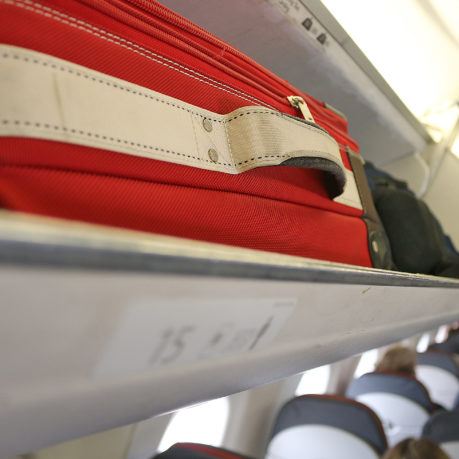 Overhead storage compartment bin