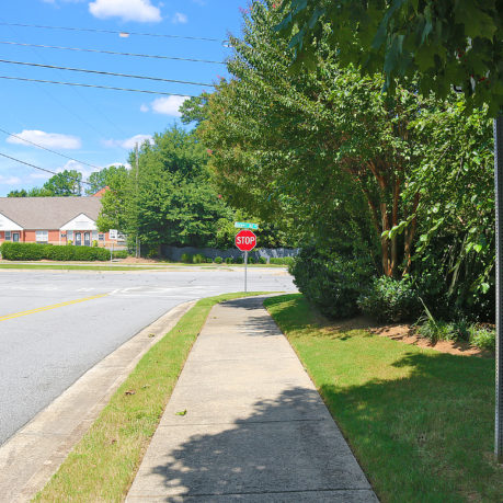 a stop sign on the side of a road