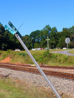 a pole on a train track