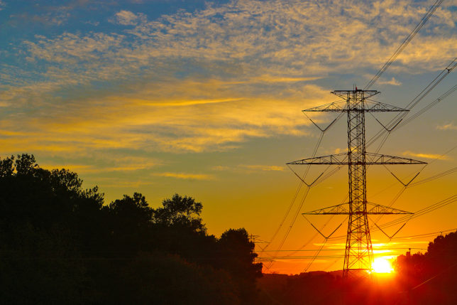 Electric power lines sunrise
