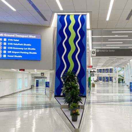 a blue and green sign in a building