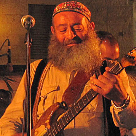 a man playing a guitar