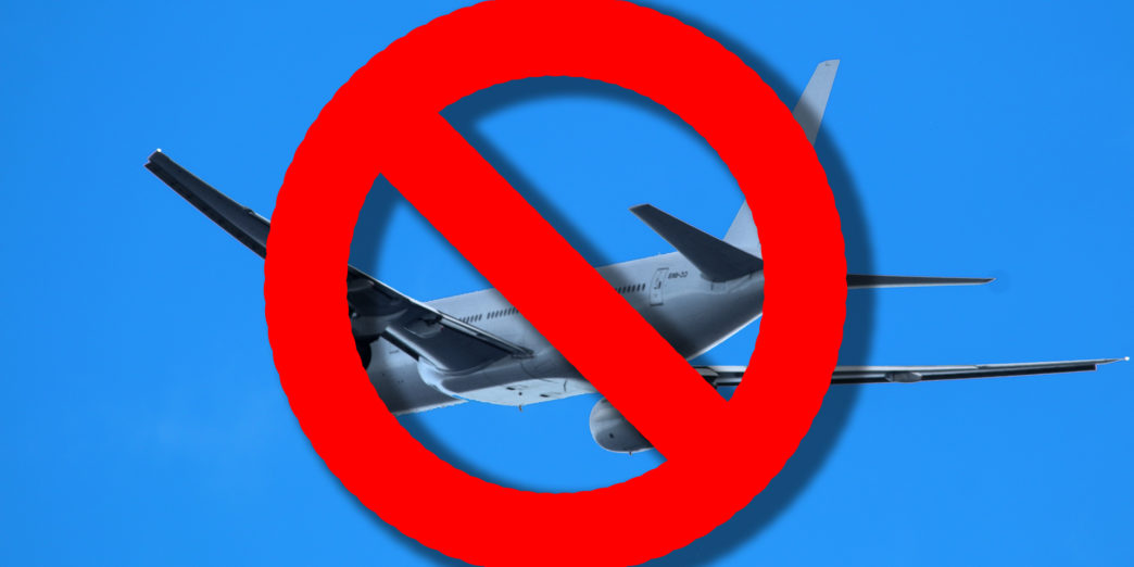 a no plane sign with a red circle around it