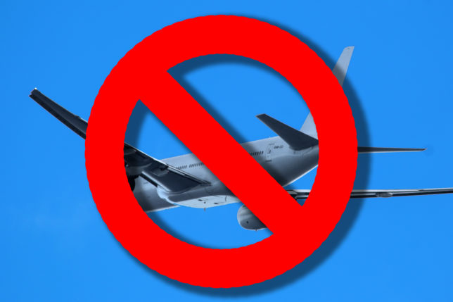 a no plane sign with a red circle around it