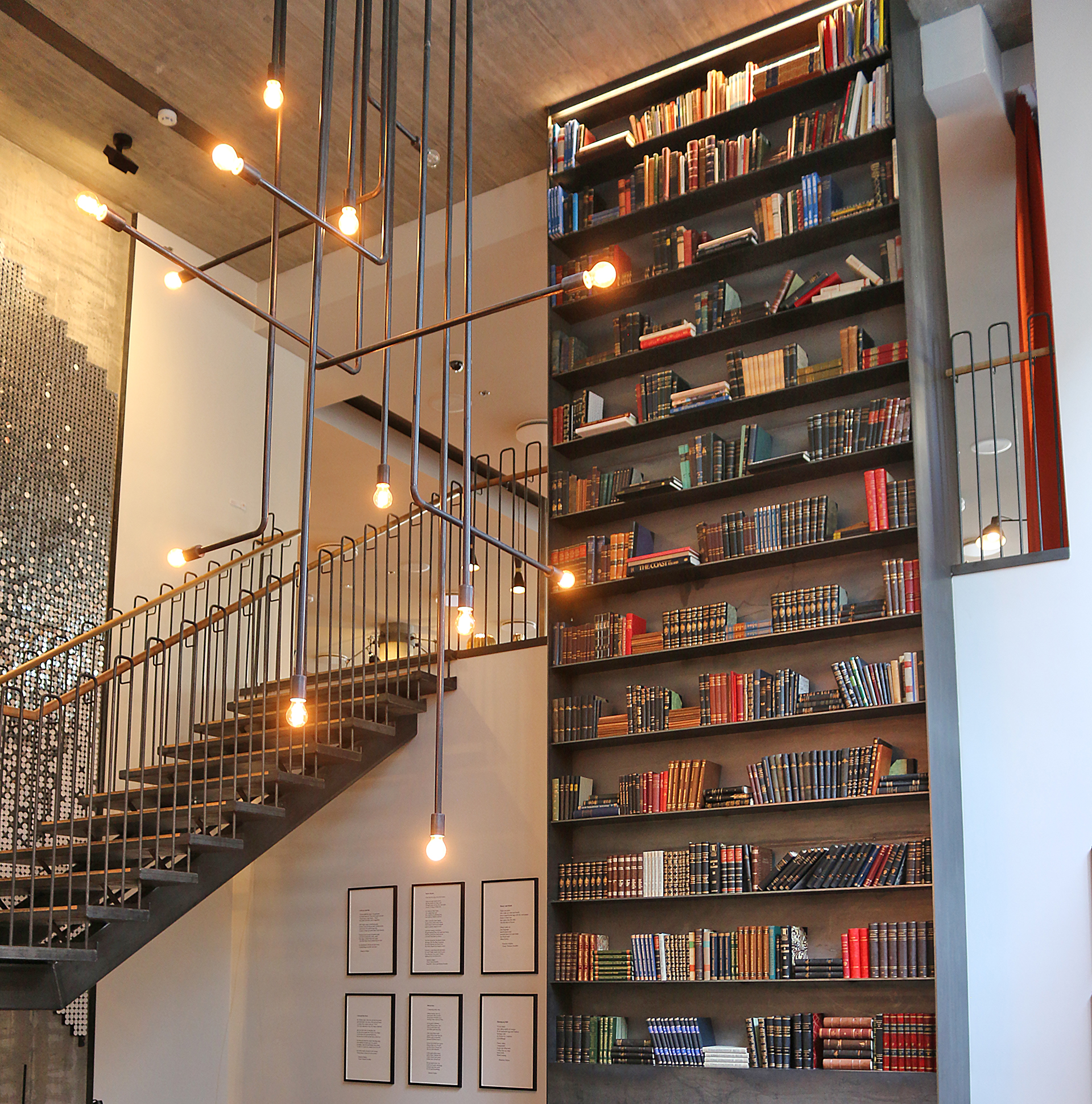 a staircase with books on shelves