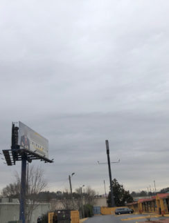 a billboard on a pole