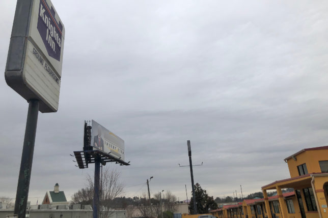 a billboard on a pole