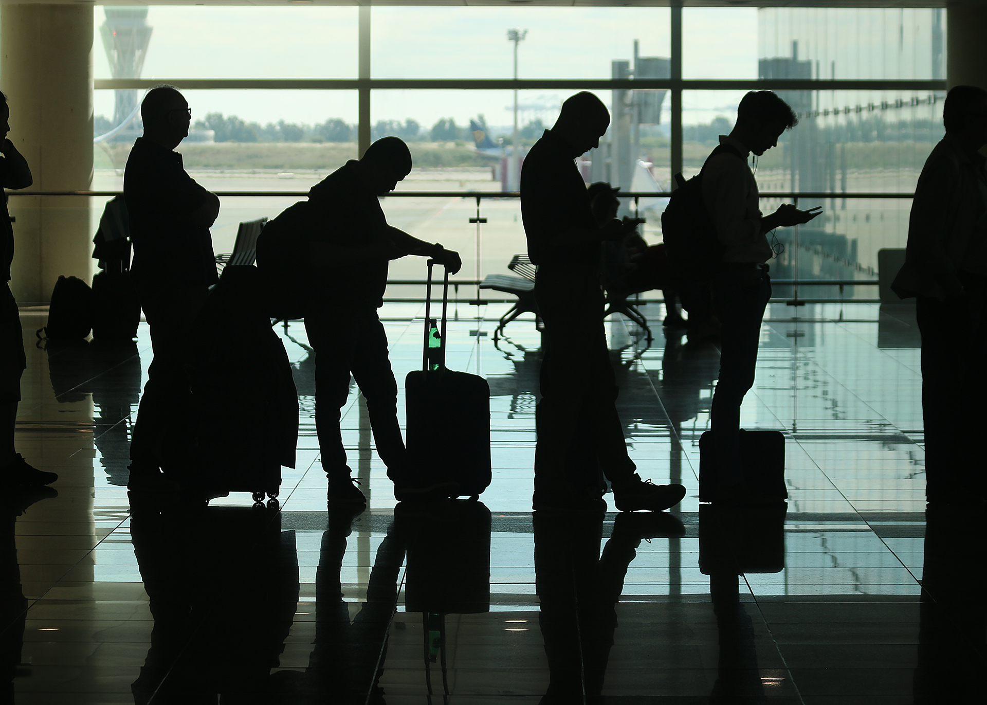 airport gate people silhouette