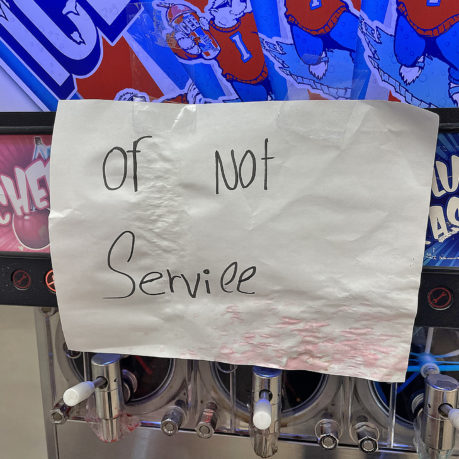 a paper sign on a machine