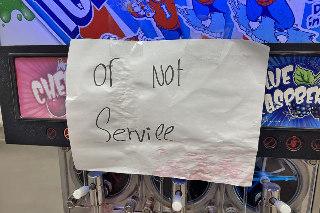 a paper sign on a machine