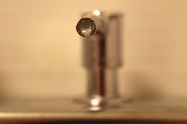 Bulk dispenser nozzle