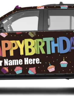 a car with a birthday sign