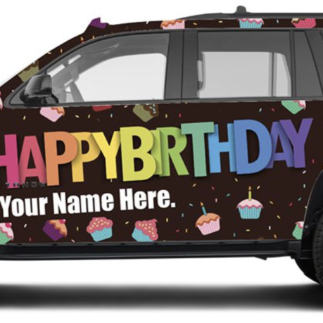 a car with a birthday sign