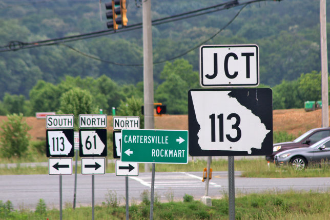 a group of street signs