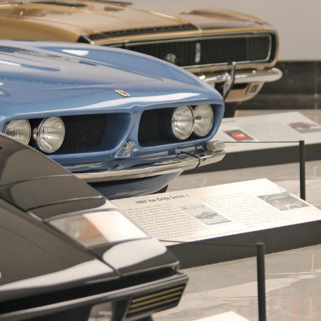a group of cars on display