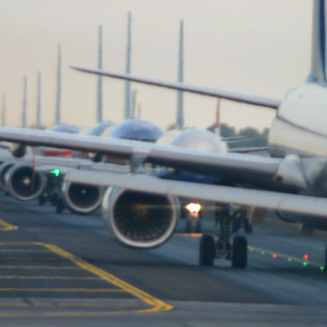 Airplanes lined up on runway