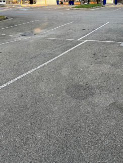 a parking lot with white lines