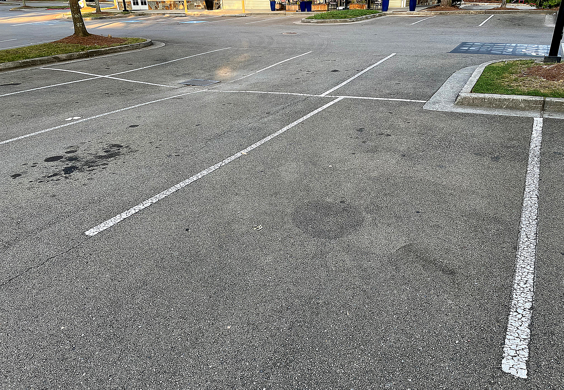 a parking lot with white lines