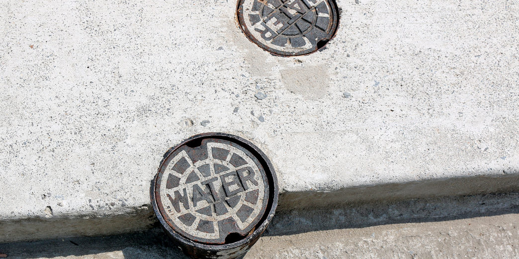 a close up of a manhole cover