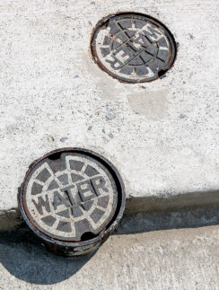 a close up of a manhole cover