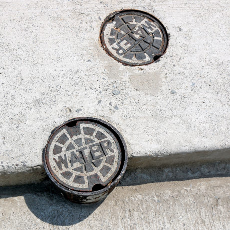 a close up of a manhole cover